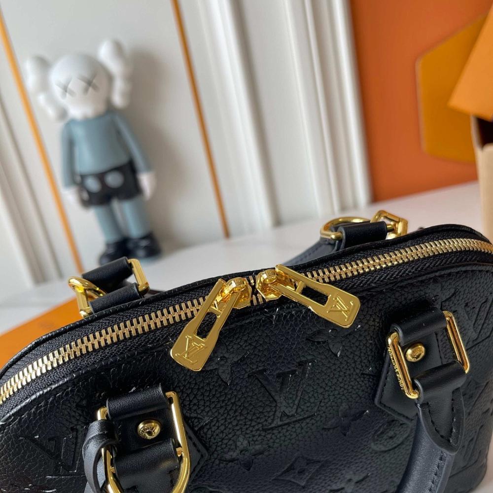 Alma Gold Monogram Leather Bucket Bag