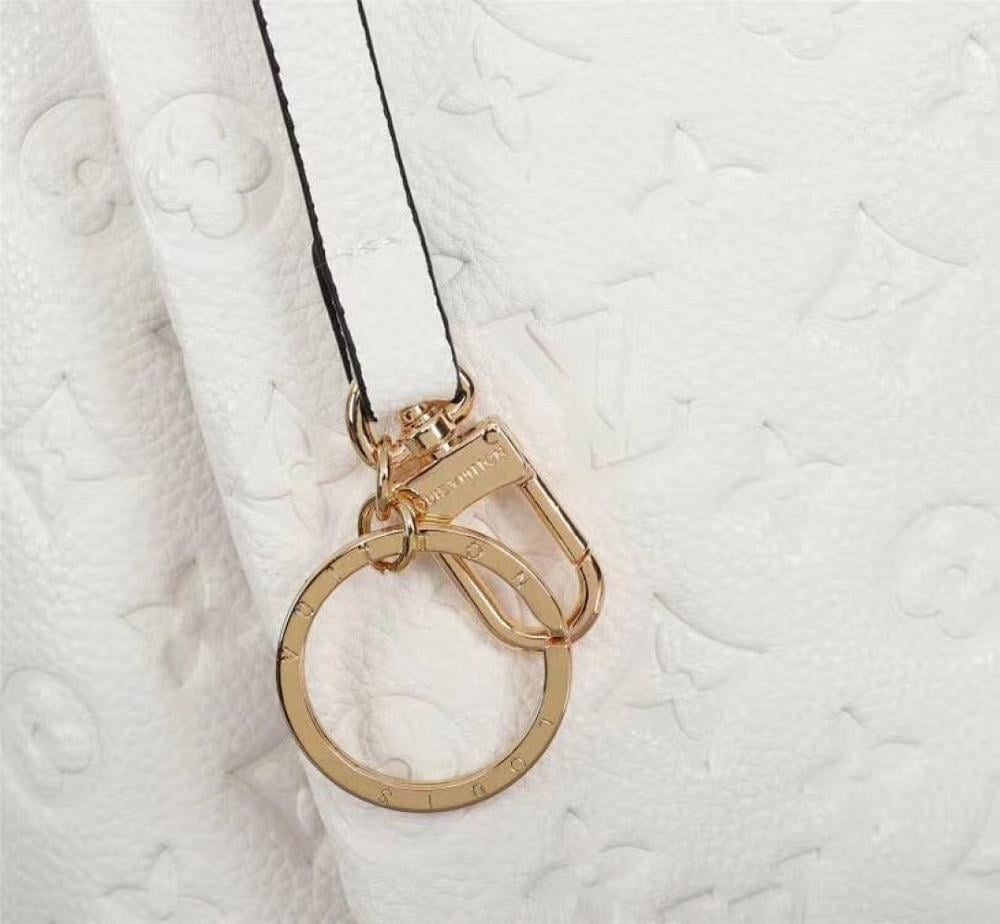 Modern Italian-Inspired Gold Monogram Top Handle Bag