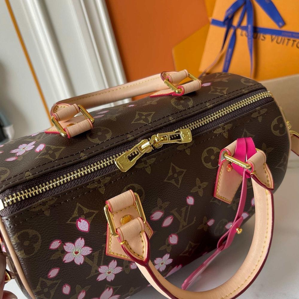 Speedy Monogram Leather Top Handle Bag