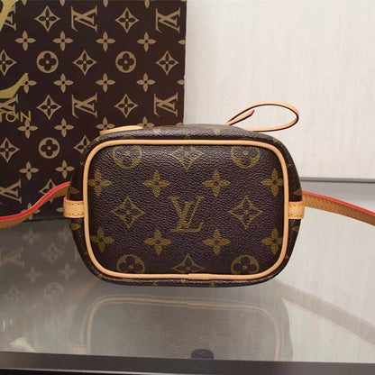 Kate Monogram Top Handle Bag