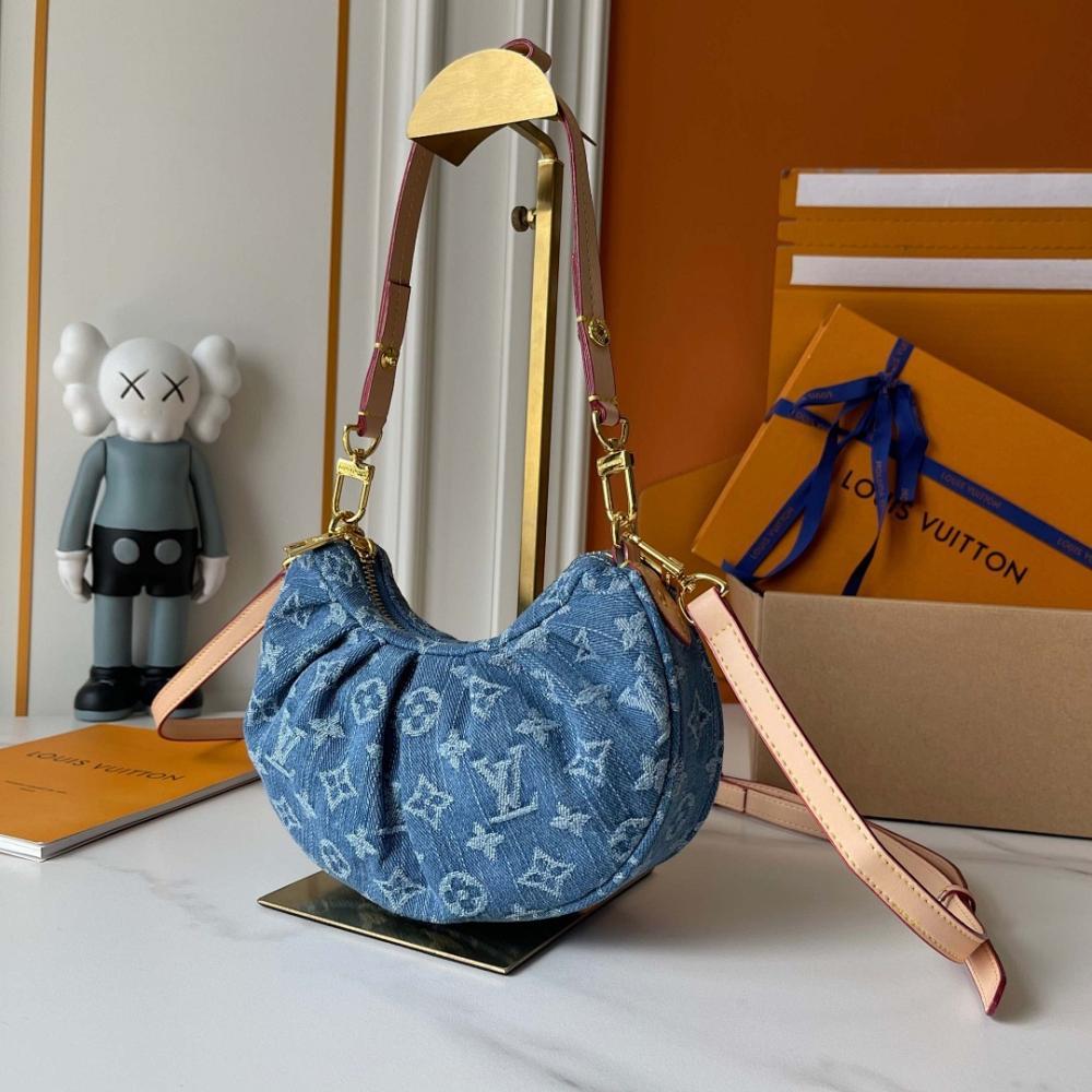 The Pouch Monogram Leather Top Handle Bag