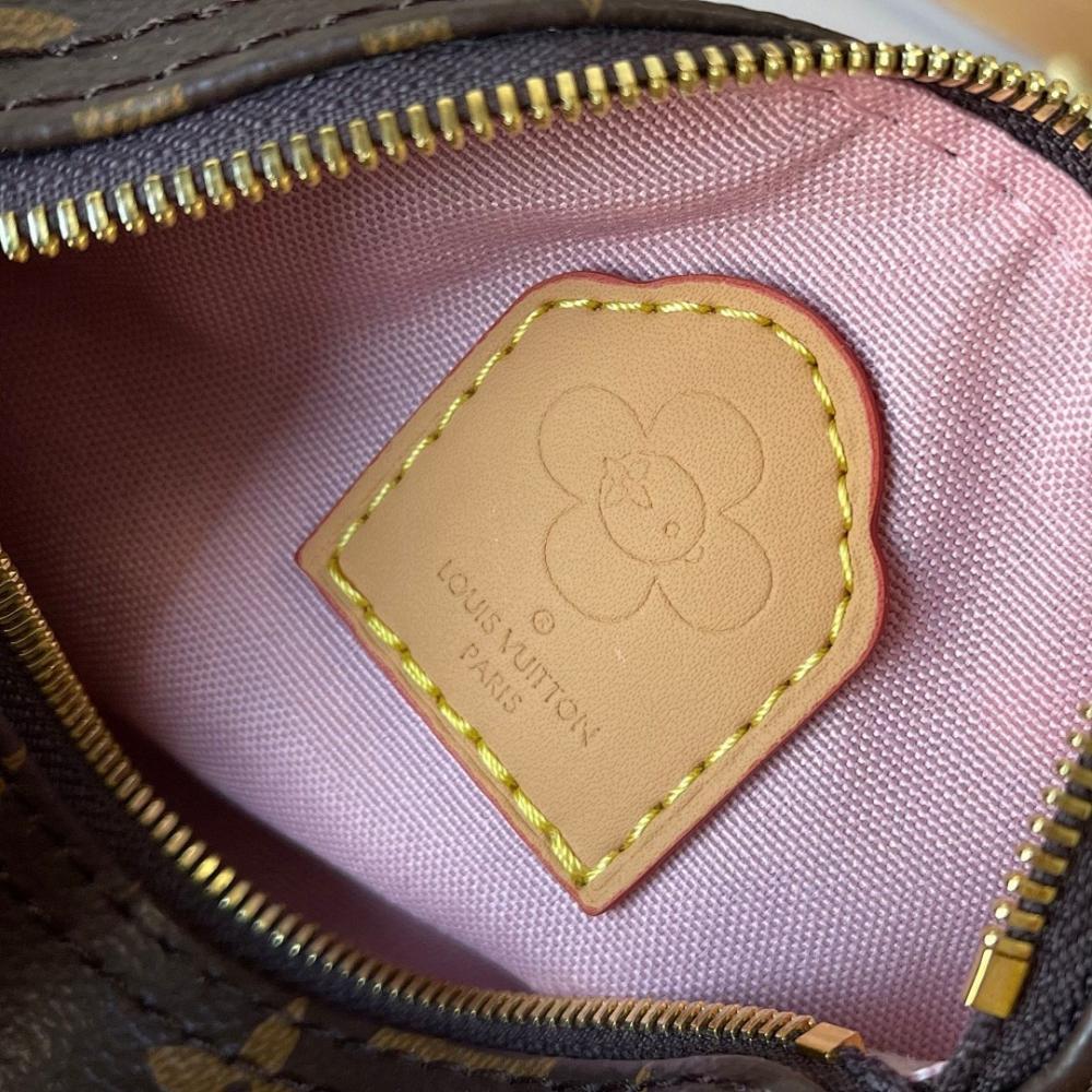 Speedy Monogram Leather Top Handle Bag