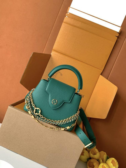 Capucines Gold Top Handle Bag