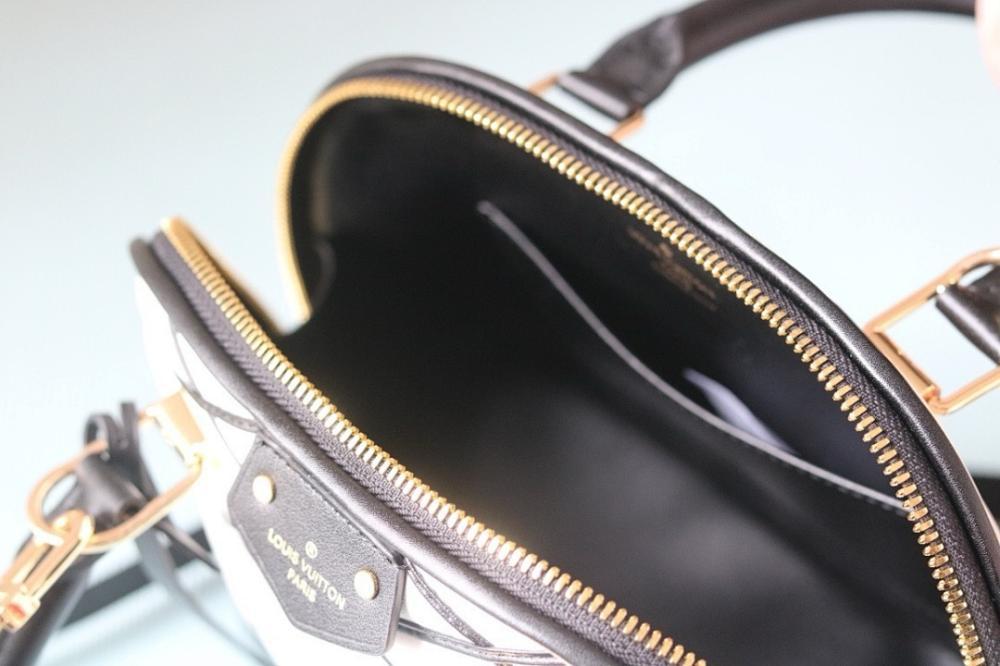 Alma Quilted Lambskin Travel Bag