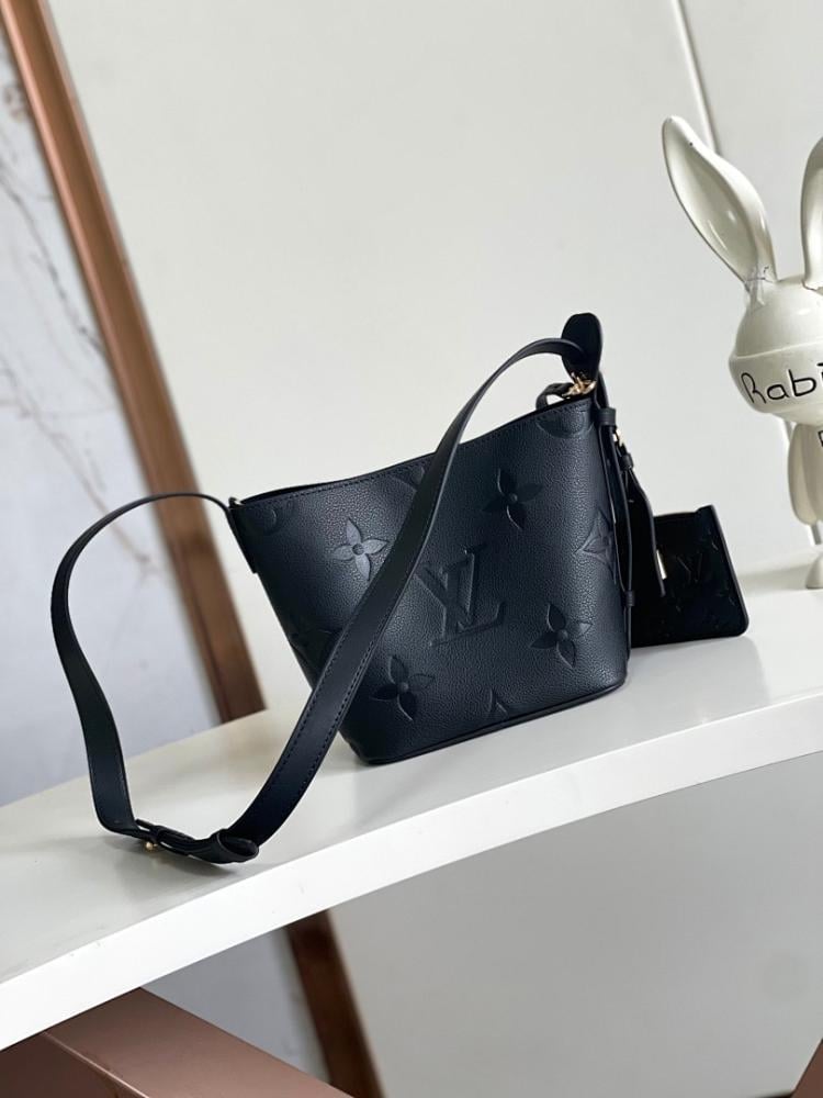 Modern Refined Monogram Leather Bucket Bag