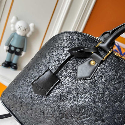Alma Gold Monogram Leather Bucket Bag