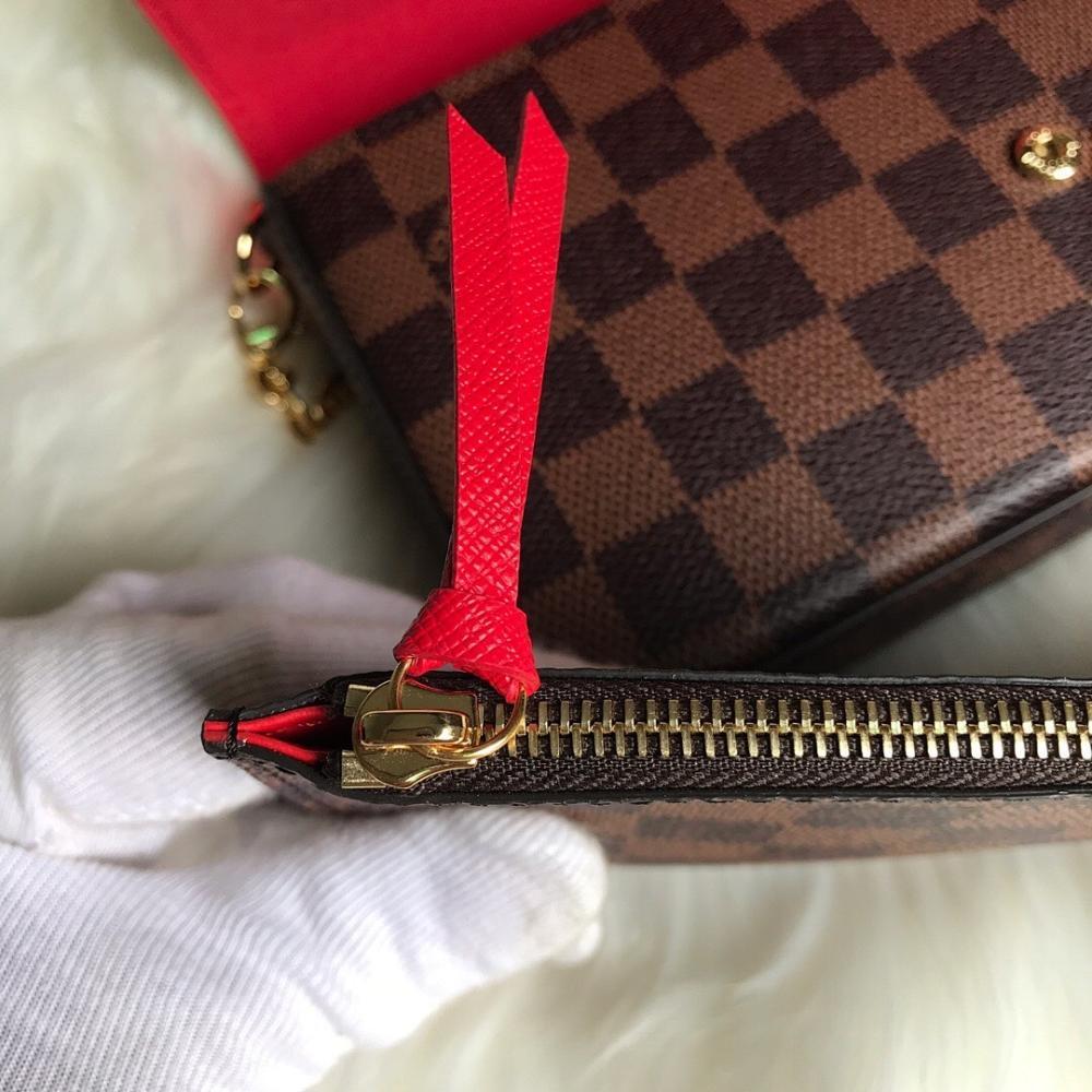 Elegant Gold Top Handle Bag – Limited Edition