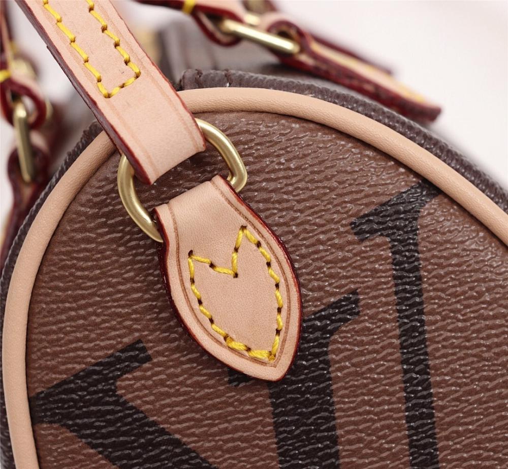 Speedy Monogram Top Handle Bag