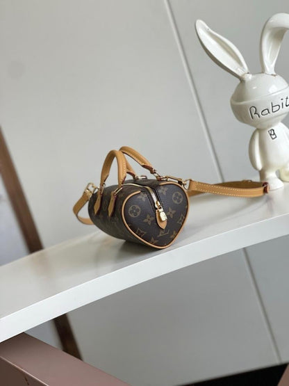 Speedy Monogram Leather Top Handle Bag