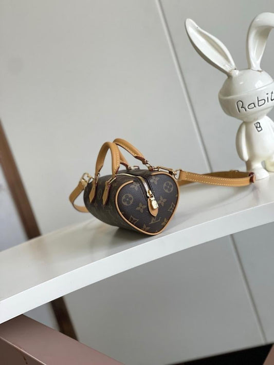 Speedy Monogram Leather Top Handle Bag
