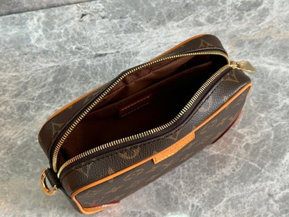 Alma Monogram Leather Crossbody Bag