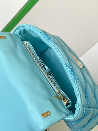 Elegant Quilted Lambskin Top Handle Bag – Special Edition
