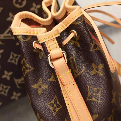 Kate Monogram Top Handle Bag