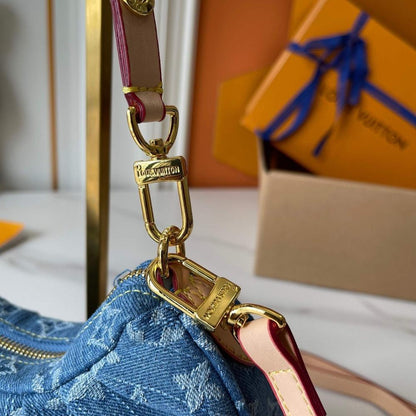 The Pouch Monogram Leather Top Handle Bag