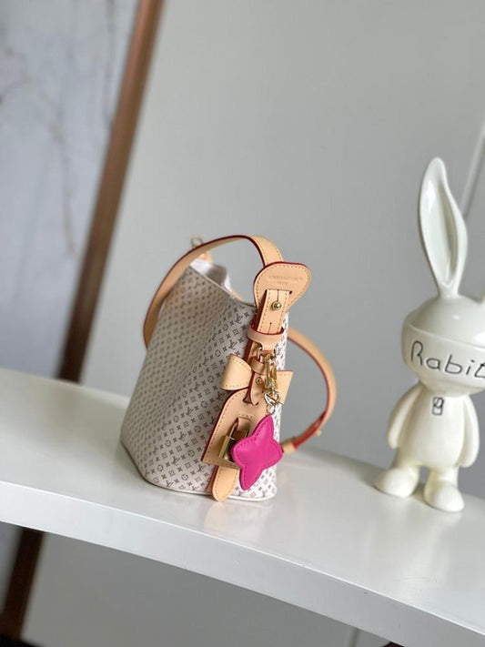 Elegant Refined Monogram Calfskin Top Handle Bag