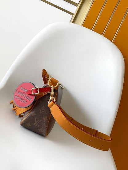 Alma Monogram Top Handle Bag