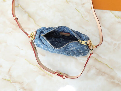 The Pouch Monogram Leather Shoulder Bag