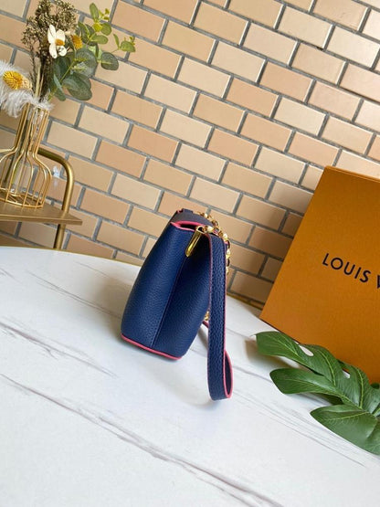 Capucines Leather Top Handle Bag