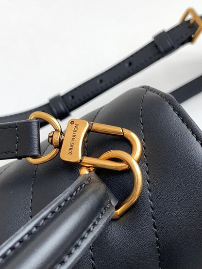 Modern Quilted Leather Top Handle Bag