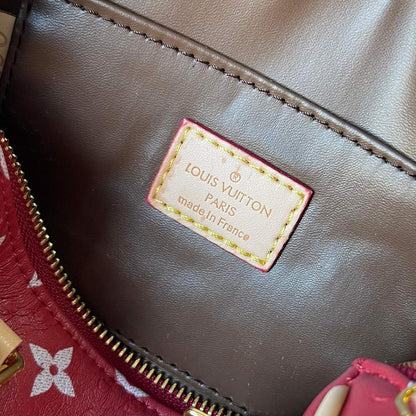Alma Monogram Leather Shoulder Bag
