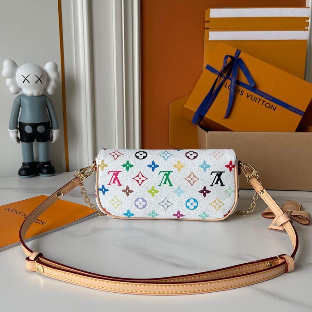 Speedy Monogram Leather Top Handle Bag