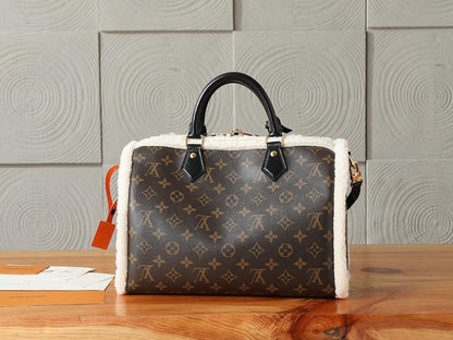 Elegant Refined Monogram Lambskin Top Handle Bag