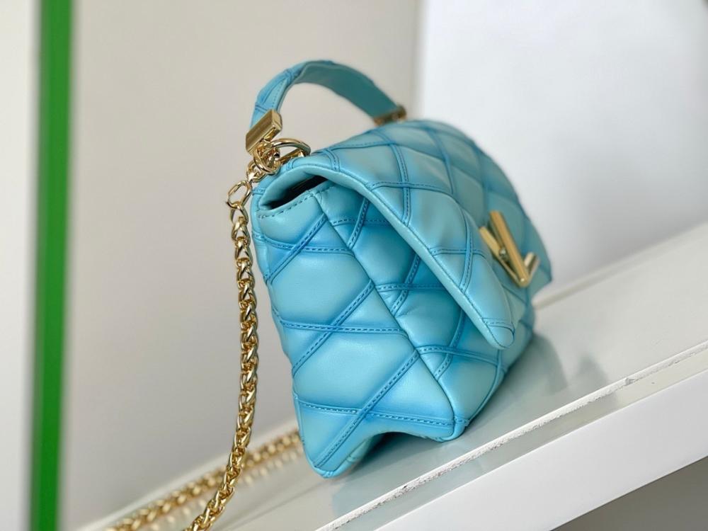 Elegant Quilted Lambskin Top Handle Bag – Special Edition