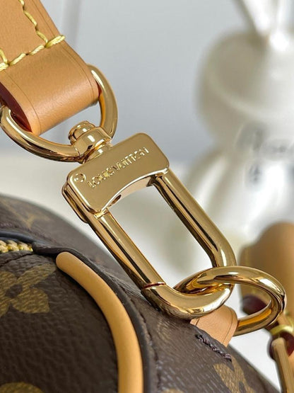 Speedy Monogram Leather Top Handle Bag