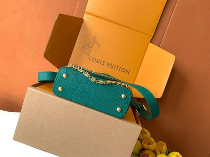 Capucines Gold Top Handle Bag