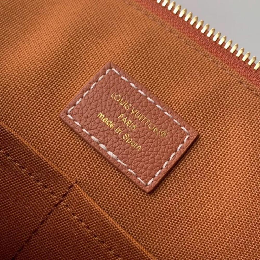 Alma Gold Denim Top Handle Bag