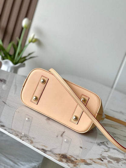 Alma Monogram Leather Top Handle Bag