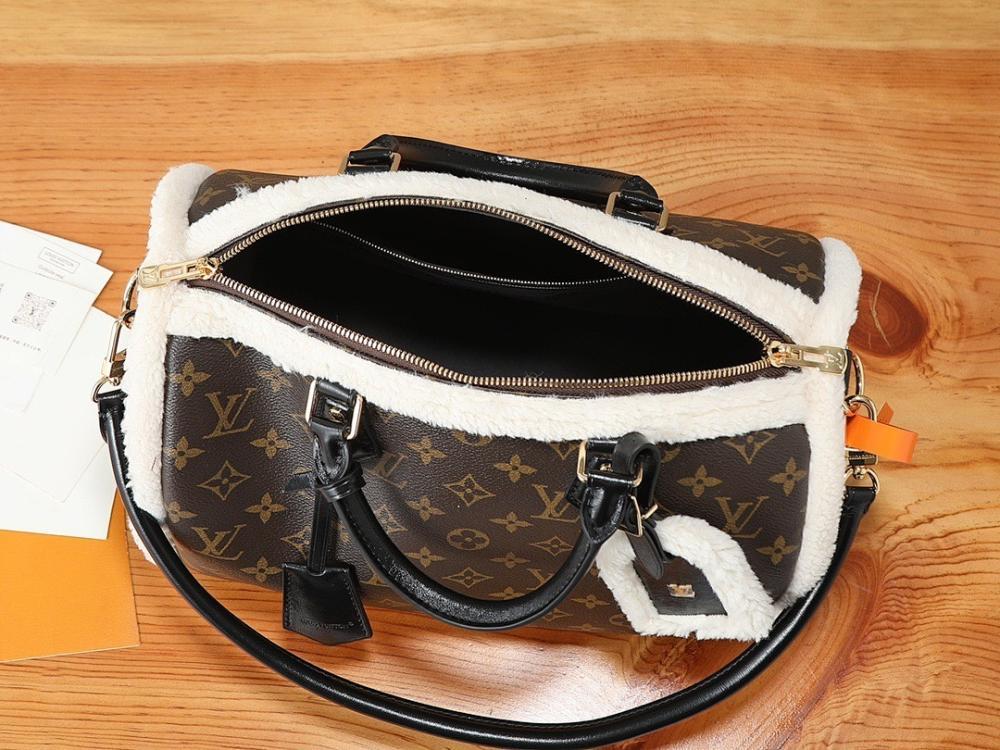 Elegant Refined Monogram Lambskin Top Handle Bag