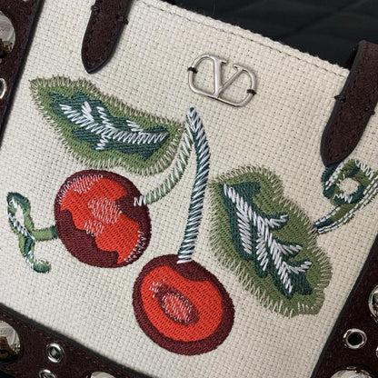 Embroidered Leather Top Handle Bag