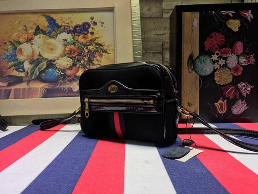 Ophidia Top Handle Bag