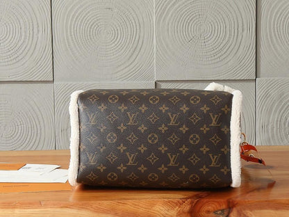 Elegant Refined Monogram Lambskin Top Handle Bag