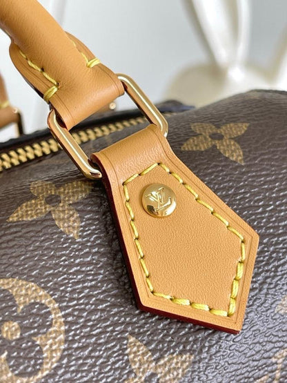 Speedy Monogram Leather Top Handle Bag