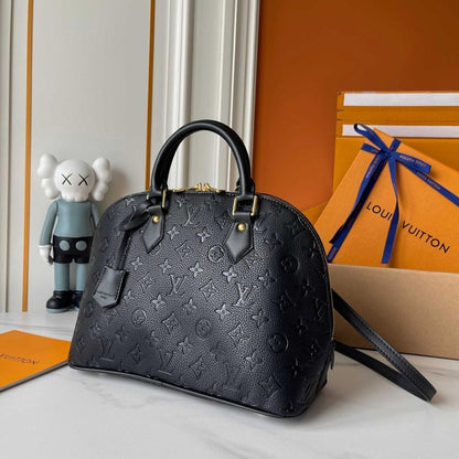 Alma Gold Monogram Leather Bucket Bag