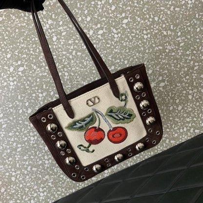 Embroidered Leather Top Handle Bag