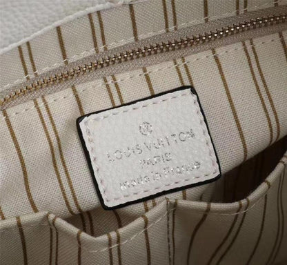 Modern Italian-Inspired Gold Monogram Top Handle Bag