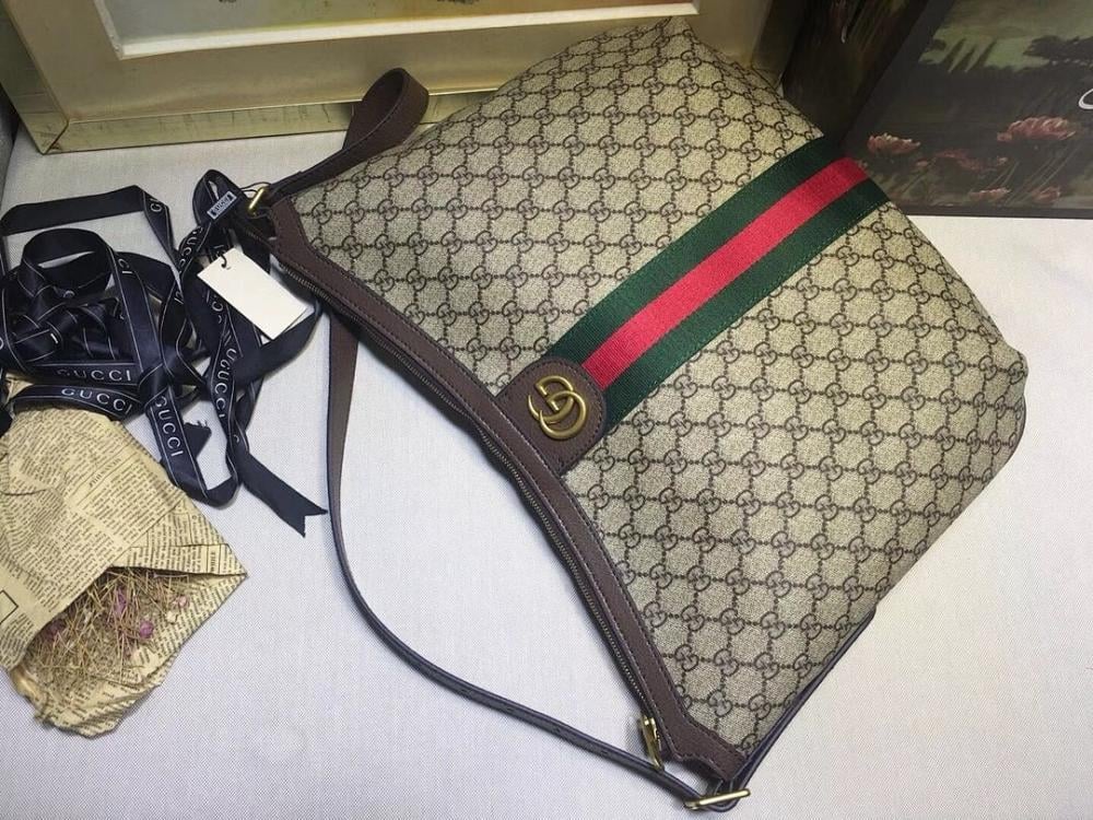 Ophidia Top Handle Bag