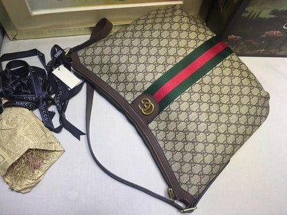 Ophidia Top Handle Bag