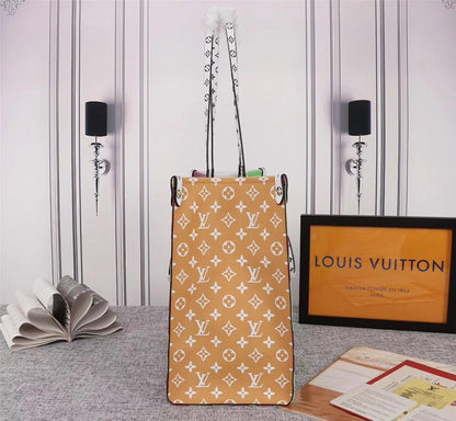 OnTheGo Gold Monogram Tote Bag