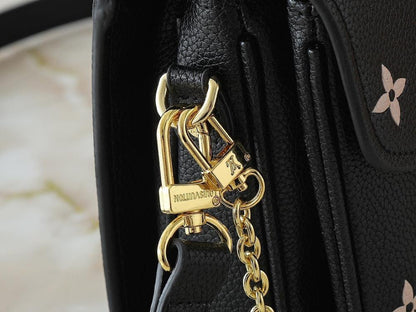 The Pouch Monogram Leather Top Handle Bag