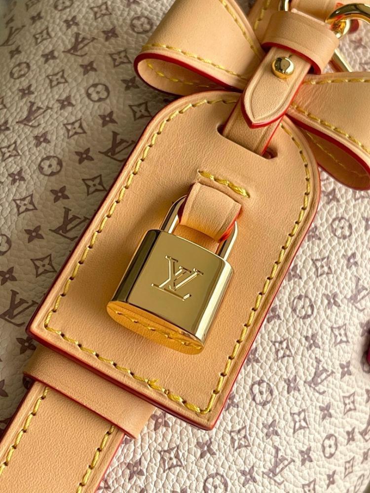 Elegant Refined Monogram Calfskin Top Handle Bag