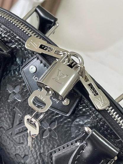 Alma Monogram Leather Crossbody Bag