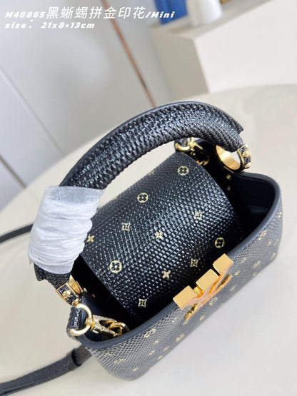 Capucines Leather Top Handle Bag