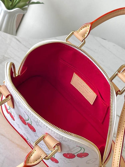Alma Monogram Leather Top Handle Bag
