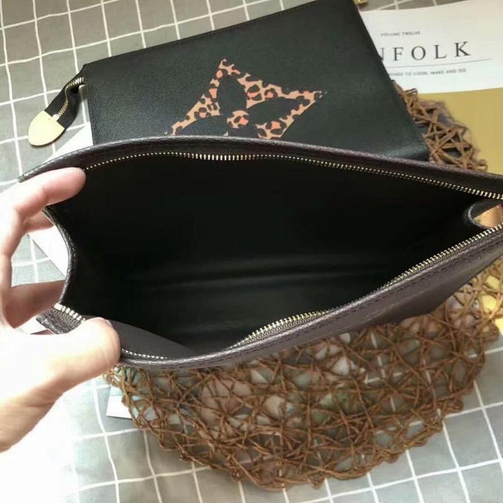 Luxury Elegant Monogram Canvas Top Handle Bag – Limited Edition
