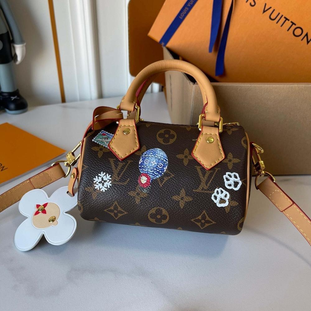 Speedy Monogram Leather Top Handle Bag