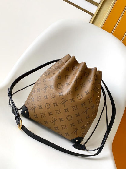 Woven Leather Top Handle Bag